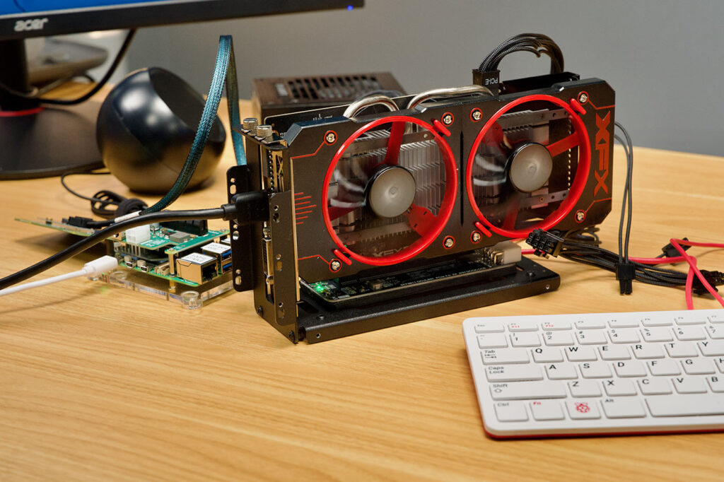 Raspberry Pi 5 conectada a una GPU AMD por OCuLink según el montaje de Jeff Geerling